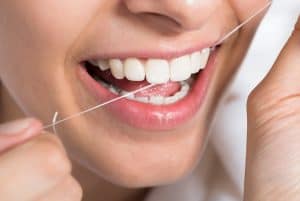 Brushing And Flossing: How Much Is Too Much? 4