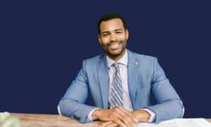 Confident professional smiling in a business setting, how a healthy smile shapes first impressions and workplace perception